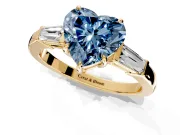 3 Stone Engagement Ring Setting for Fancy Blue Heart-Shaped Center with Baguette Accents and Prong Head in Yellow Gold