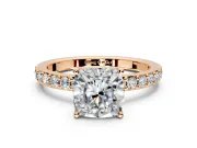 Solitaire Engagement Ring Setting for Cushion Cut Center with Round Cut Pave Band and Prong Head in Rose Gold