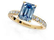 Solitaire Engagement Ring Setting for Fancy Blue Emerald Cut Center with Round Cut Pave Band and Prong Head in Yellow Gold