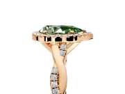 Halo Engagement Ring Setting for Fancy Green Pear-Shaped Center with Pave and Plain Twist Band and Prong Head in Rose Gold