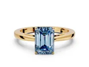 Solitaire Engagement Ring Setting for Fancy Blue Emerald Cut Center with Open Cathedral Shoulders and Prong Head in Yellow Gold