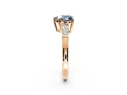 3 Stone Engagement Ring Setting for Fancy Blue Heart-Shaped Center with Baguette Accents and Prong Head in Rose Gold