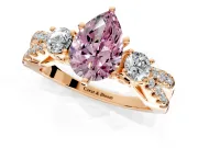 3 Stone Engagement Ring Setting for Fancy Pink Pear-Shaped Center with Pave Split Shank and Prong Head in Rose Gold