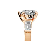 3 Stone Engagement Ring Setting for Heart-Shaped Center with Channel Baguette Accents and Prong Head in Rose Gold