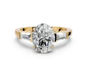 3 Stone Engagement Ring Setting for Oval Center with Baguette Accents and Prong Head in Yellow Gold