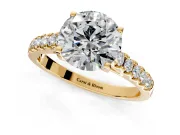 Solitaire Engagement Ring Setting for Round Cut Center with Partway Pave Band and Prong Head in Yellow Gold