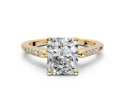 Solitaire Engagement Ring Setting for Radiant Cut Center with Channel Accents and Prong Head in Yellow Gold