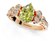 Cluster Engagement Ring Setting for Fancy Yellow Pear-Shaped Center with Bezel Accent Clusters and Prong Head in Rose Gold
