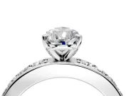 Solitaire Engagement Ring Setting for Pear-Shaped Center with Channel-Set Accents and Prong Head in Platinum