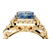 Halo Engagement Ring Setting for Fancy Blue Princess Cut Center with Open Scroll Shoulders and Prong Head in Yellow Gold