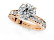 Solitaire Engagement Ring Setting for Round Cut Center with Channel-Set Accents and Prong Head in Rose Gold