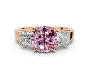 3 Stone Engagement Ring Setting for Fancy Pink Round Cut Center with Matching Side Accents and Prong Head in Rose Gold