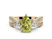 3 Stone Engagement Ring Setting for Fancy Yellow Pear-Shaped Center with Pave Twist Band and Prong Head in Yellow Gold