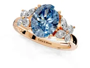 Floral Engagement Ring Setting for Fancy Blue Oval Center with Marquise Cluster Shoulders and Prong Head in Rose Gold