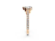 Solitaire Engagement Ring Setting for Pear-Shaped Center with Widening Pave Band and Claw Prong Head in Rose Gold