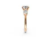 3 Stone Engagement Ring Setting for Round Cut Center with Large Pear-Shaped Accents and Prong Head in Rose Gold