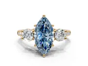 3 Stone Engagement Ring Setting for Fancy Blue Marquise Center with Crossover Basket, Pave Band and Prong Head in Yellow Gold