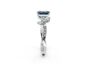 Floral Engagement Ring Setting for Fancy Blue Emerald Cut Center with Trailing Marquise Accents and Prong Head in Platinum