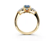 3 Stone Engagement Ring Setting for Fancy Blue Emerald Cut Center with Large Pear-Shaped Accents and Prong Head in Yellow Gold
