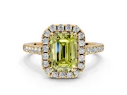Halo Engagement Ring Setting for Fancy Yellow Emerald Cut Center with Narrowing Pave Band and Prong Head in Yellow Gold