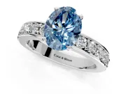 Solitaire Engagement Ring Setting for Fancy Blue Oval Center with Channel-Set Accents and Prong Head in Sterling Silver