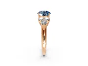 Cluster Engagement Ring Setting for Fancy Blue Round Cut Center with Round Cut Accent Frame and Prong Head in Rose Gold