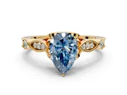 Solitaire Engagement Ring Setting for Fancy Blue Pear-Shaped Center with Marquise and Bezel Accents and Prong Head in Yellow Gold
