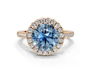 Halo Engagement Ring Setting for Fancy Blue Round Cut Center with Narrowing Pave Band and Prong Head in Rose Gold