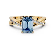 Crossover Engagement Ring Setting for Fancy Blue Emerald Cut Center with Pave and Plain Strands and Prong Head in Yellow Gold