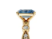 Solitaire Engagement Ring Setting for Fancy Blue Emerald Cut Center with Milgrain Bezel Accents and Prong Head in Yellow Gold