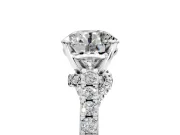 Solitaire Engagement Ring Setting for Round Cut Center with Crossover Accents and Prong Head in Platinum