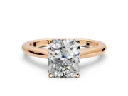 Solitaire Engagement Ring Setting for Radiant Cut Center with Narrow Cathedral Band and Prong Head in Rose Gold