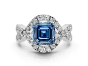 Halo Engagement Ring Setting for Fancy Blue Asscher Cut Center with Pave Infinity Twist Band and Prong Head in White Gold