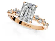 Cluster Engagement Ring Setting for Emerald Cut Center with Round Cut Accent Band and Prong Head in Rose Gold