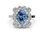 Cluster Halo Engagement Ring Setting for Fancy Blue Oval Center with Milgrain Bezel Accents and Prong Head in White Gold