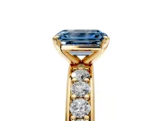 Solitaire Engagement Ring Setting for Fancy Blue Emerald Cut Center with Channel-Set Accents and Prong Head in Yellow Gold
