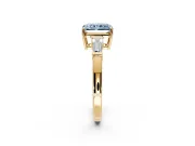 3 Stone Engagement Ring Setting for Fancy Blue Radiant Cut Center with Baguette Accents and Prong Head in Yellow Gold