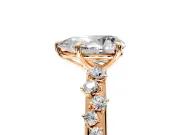Cluster Engagement Ring Setting for Pear-Shaped Center with Round Cut Accent Band and Prong Head in Rose Gold
