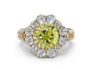 Large Accent Halo Engagement Ring Setting for Fancy Yellow Round Cut Center with Pave Split Shank and Prong Head in Yellow Gold
