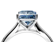 Solitaire Engagement Ring Setting for Fancy Blue Princess Cut Center with Narrow Cathedral Band and Prong Head in White Gold