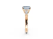 3 Stone Engagement Ring Setting for Fancy Blue Asscher Cut Center with Baguette Accents and Prong Head in Rose Gold