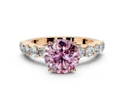 Shared-Prong Engagement Ring Setting for Fancy Pink Round Cut Center with Graduated Accents and Prong Head in Rose Gold