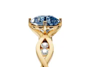 Solitaire Engagement Ring Setting for Fancy Blue Round Cut Center with Accented Twist Band and Leaf Prong Head in Yellow Gold