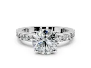 Solitaire Engagement Ring Setting for Round Cut Center with Milgrain-Edged Pave Band and Prong Head in White Gold
