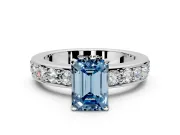 Solitaire Engagement Ring Setting for Fancy Blue Emerald Cut Center with Channel-Set Accents and Prong Head in Platinum
