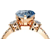 3 Stone Engagement Ring Setting for Fancy Blue Heart-Shaped Center with Round Cut Side Accents and Prong Head in Rose Gold