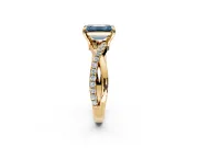 Solitaire Engagement Ring Setting for Fancy Blue Emerald Cut Center with Half-Pave Crossover Band and Prong Head in Yellow Gold