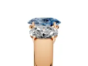 3 Stone Engagement Ring Setting for Fancy Blue Oval Center with Raised Basket Heads and Prong Head in Rose Gold