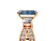 3 Stone Engagement Ring Setting for Fancy Blue Emerald Cut Center with Pave Twist Band and Prong Head in Rose Gold
