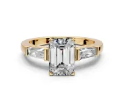 3 Stone Engagement Ring Setting for Emerald Cut Center with Tapered Baguettes, Plain Band and Prong Head in Yellow Gold